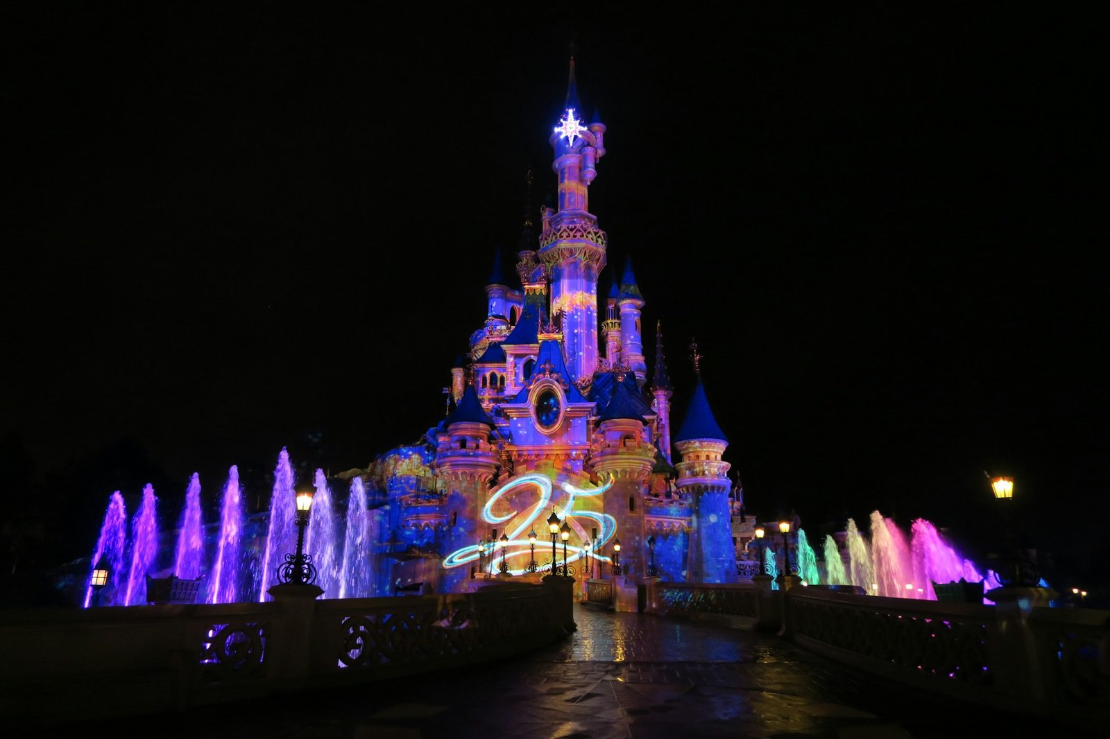 Sleeping Beauty Castle illuminated at night